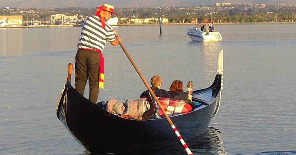 a man in a boat on a body of water